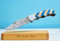 Best EDC pocket knife with 3-inch Damascus steel blade and blue olive wood handle