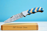 Best EDC pocket knife with 3-inch Damascus steel blade and blue olive wood handle