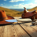 Hand-forged Frontier cowboy belt knife with walnut wood handle and rasp steel blade next to cowboy hat – Western hunting knife by ZB Knives Store