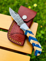 Close-up of 3-inch Damascus steel blade on best EDC pocket knife