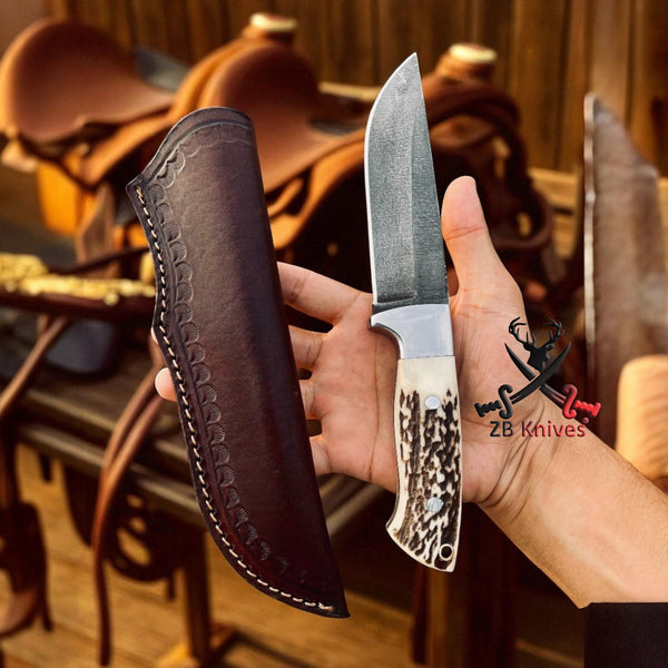 Handcrafted Hunting Knife: Stag Horn Handle, Leather Sheath, Sharp Steel Blade
