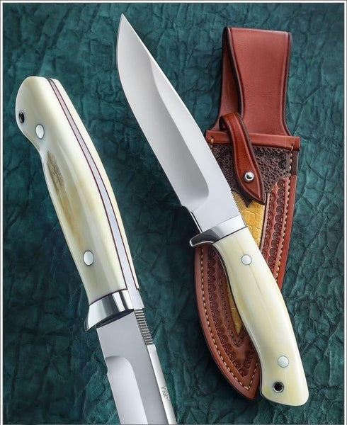 Jesse James Big Fixie Survival Knife 9.5 A2 Black Cerakote Drop Point,  Hollow Black Steel Handles, MOLLE Compatible Boltaron Belt Sheath -  KnifeCenter - JJKC4DP